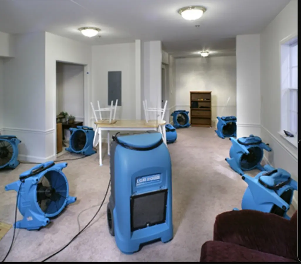 Air movers and dehumidifier setup for Water Damage Restoration in West Greenwich